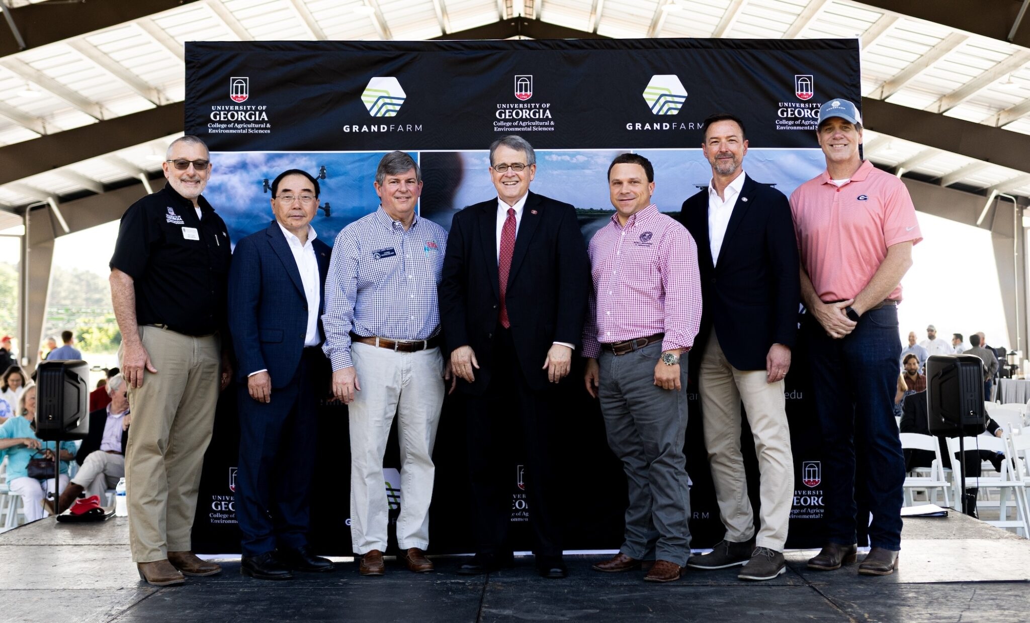 University of Georgia President Jere W. Morehead (center) joins Grand Farm and UGA College of Agricultural and Environmental Sciences leadership, including CAES Dean and Director Nick T. Place (far left), and Georgia Commissioner of Agriculture Tyler Harper (third from right), to celebrate the launch of UGA Grand Farm during a groundbreaking ceremony in Perry, Georgia. (Photo by Sean Montgomery)