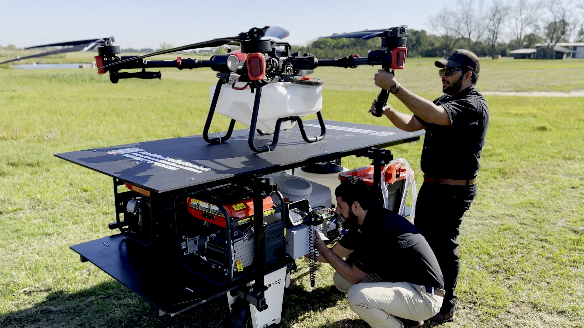 UGA's Precision Horticulture Lab team members working on a docking and refueling station for agricultural spray drones called Drone Dock.