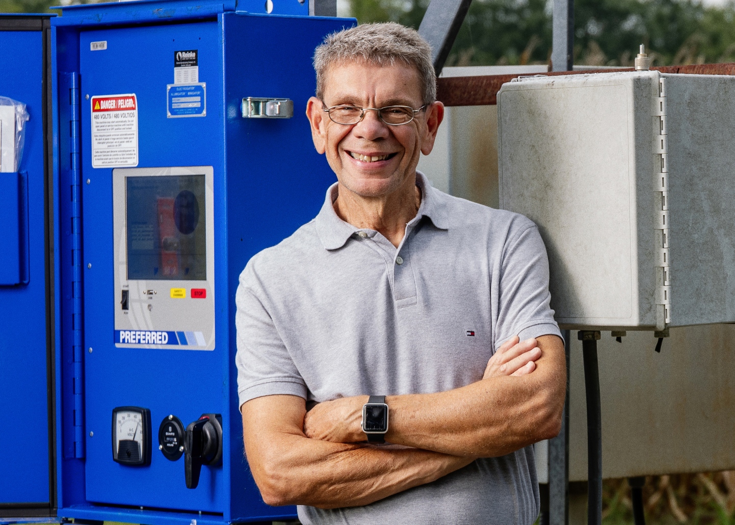 George Vellidis standing with his precision agriculture irrigation invention that is connected to an irrigation pivot on the University of Georgia's Tifton campus on August 15, 2024.